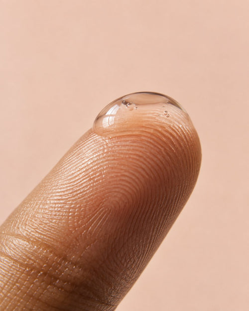 Clear-N 5 Serum texture on a fingertip